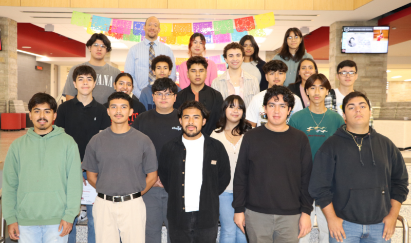 EAHS students that earned academic honors by the College Board National Recognition Program. Principal of EAHS, Jerry Cook, is also featured in the photo. (Not all 29 students are featured)