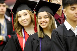 two girls graduating high school